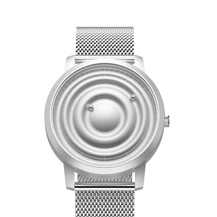 Orbitra Magnetic Watch with minimalist design and magnetic ball bearing system on silver mesh band.