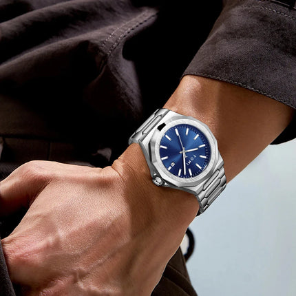 Northport Business Watch with blue dial and stainless steel band on wrist
