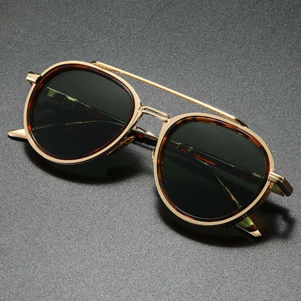 Altura Signature Shades round polarised sunglasses with alloy frame and classic design on a dark background