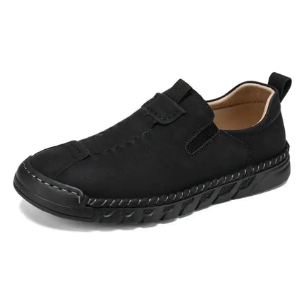 Catania Genuine Leather Loafers in black, featuring slip-on design with hand-stitched details, elastic side panels, and durable outsole.