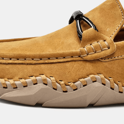 Fiorenzo Hand-Stitched Loafers in suede, showcasing hand-stitched detailing and a durable sole. Perfect men's leather loafers for formal and luxury style.