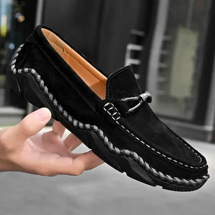 Fiorenzo Hand-Stitched Loafers in black suede showcasing elegant slip-on design and premium craftsmanship for formal men's wear.