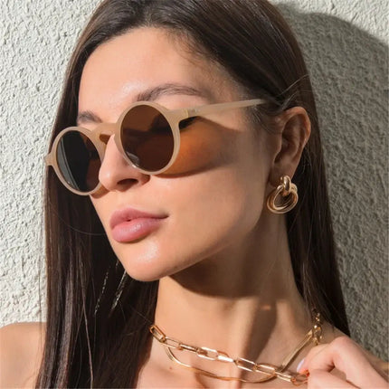 Woman wearing stylish Marlowe Shades with UV protection and polarized lenses, perfect for driving, travel, and outdoor activities.