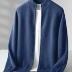 Merino Crest Cardigan for men, knitted from 100% premium merino wool, showcasing a seamless, warm and soft design perfect for winter wear.