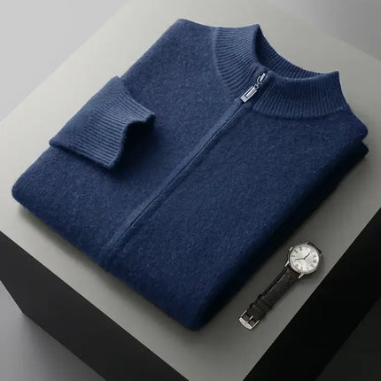 Men's Merino Crest Cardigan in navy blue, crafted from 100% merino wool, offering superior warmth and comfort for winter wear.