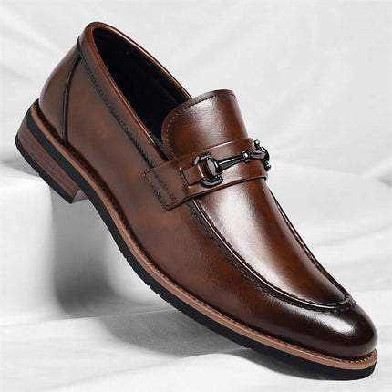 Montovani Leather Loafers showcasing elegant slip-on design in premium brown leather with refined metal bit.