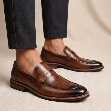 Montovani Leather Penny Loafers showcasing sleek, premium leather design with cushioned insole, perfect for sophisticated men's formal style.