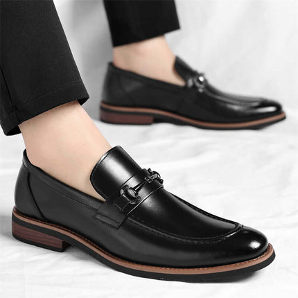Montovani Leather Loafers showcasing sleek design and premium black leather for luxurious, formal style and confident, slip-on comfort.