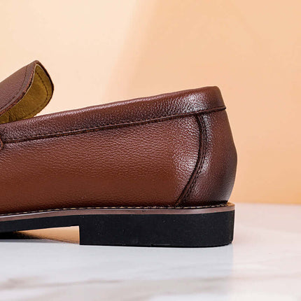 Regente Cowhide Leather Loafers showcasing elegant brown leather finish, perfect for formal wear. A premium slip-on option for modern men.