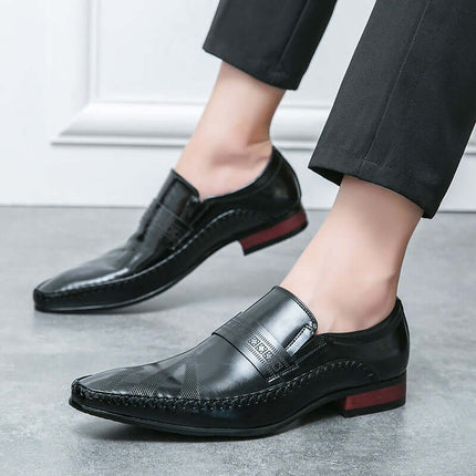 Silvano Leather Loafers in black Italian leather, showcasing elegant slip-on design, decorative strap, and stitched detailing for formal style.