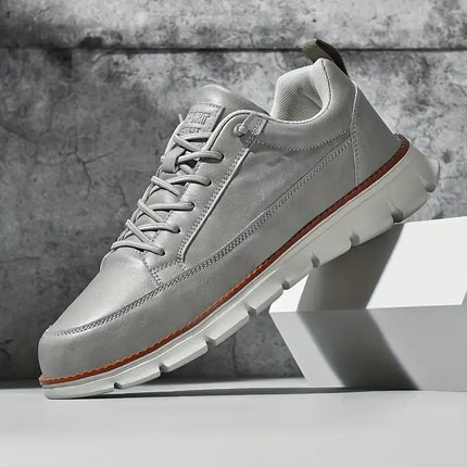 Torricelli Leather Sneakers in grey, offering comfort and style. Perfect for daily wear. Lightweight, breathable men's casual sneakers.