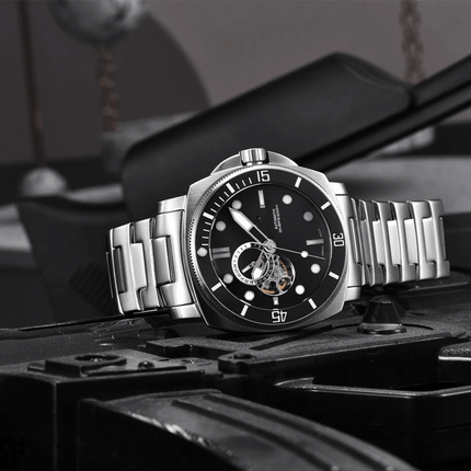 Valenor Automatic Diver Signature watch with stainless steel band on industrial background